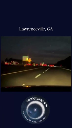 2 Orbs (or lights) captured in the sky