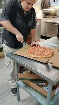 Cutting a pizza into 10 slices