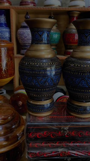 The Wooden Naqshi Art Flower Pot is a masterpiece of traditional craftsmanship, blending age-old artistry with modern luxury appeal. Carved and painted by skilled artisans, this decorative piece embodies the cultural richness of Naqshi design—a heritage technique known for its intricate detailing and regal charm. Made entirely from premium quality wood, the pot stands as a symbol of elegance, durability, and timeless style, making it a statement addition to any luxury home décor collection. #Naq