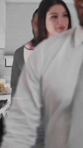 Engaging Kitchen Conversations in Formal Attire