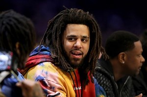 Rapper J. Cole makes his debut in African basketball league the same weekend his album drops