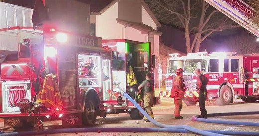 Firefighters battle blaze at Arlington business, officials say