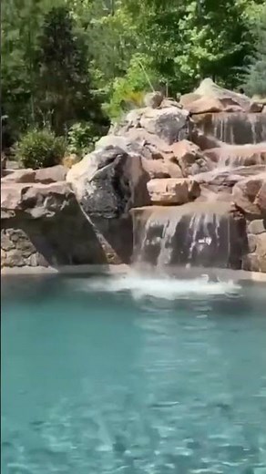 Custom Pool with Waterfall and Slide #waterfall #outdoorliving #pool #swimmingpool #pools #backyard