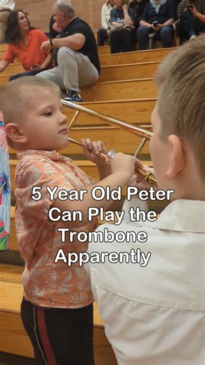 Peter picked up the trombone and gave it a try. The sound filled the entire house. Big families come with big music moments. Practice time is never quiet here. #10kidsin10years #BigFamilyLife #Peter #Trombone #MusicKids #FamilyMoments #ParentingLife #LargeFamily #EverydayMoments #HomeLife | 10kidsin10years