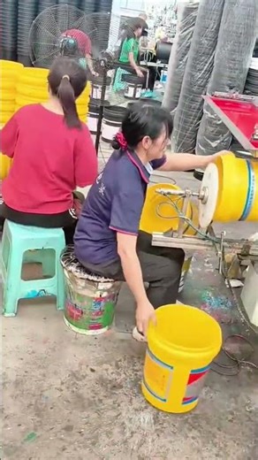 Industrial Machine Process for Printing Labels on Plastic Paint Buckets