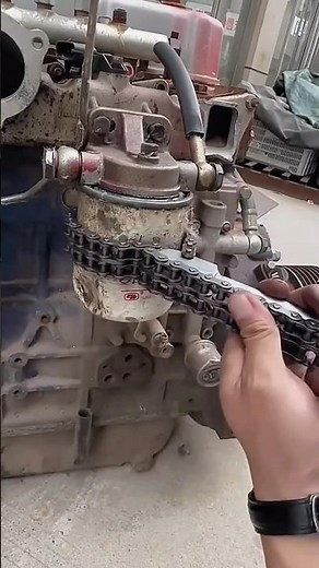 Changing a Truck's Fuel Filter Element.