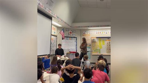 Epic proposal surprise for teacher and class during mystery reader event