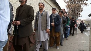 Afghans vote for future despite threats