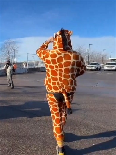 New York Post: Protester in Giraffe Costume Taken Down by ICE ICE agents in Minneapolis arrested protester and entertainer Rob Potylo, known as “Robby Roadsteamer,” who was wearing a giraffe costume during ongoing demonstrations against federal immigration enforcement efforts. The arrest occurred amid continued tensions in Minneapolis, where some residents also clashed with additional ICE officers and reports indicated the use of tear gas against demonstrators. #ice #protest #minneapolis