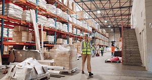 People, moving and boxes in logistics warehouse for storage or packaging, transportation and loading for distribution or shipping. Team, factory and trolley for delivery, inventory and supply chain.