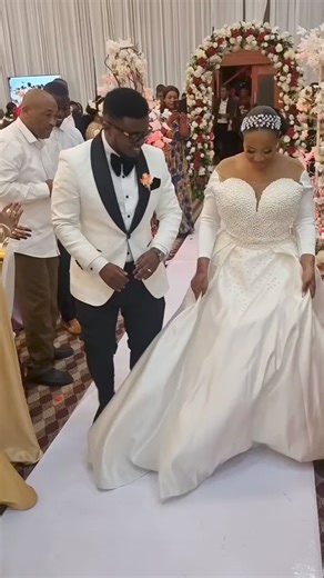 The way the groom is admiring the Bride #wedding #eastafricanweddings #weddingattire | RareMagic Photography