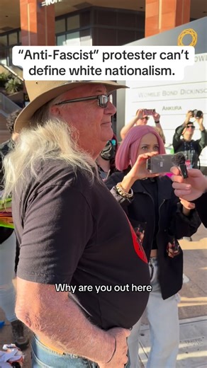 Philadelphia, PA on Instagram: "I spoke to an “Anti-Fascist” protester outside of TPUSA’s AmFest. He claimed that Turning Point stood for white nationalism, so I asked him if he knew what the phrase really meant. He responded confidently that he did, but his response was unusual for someone confidently protesting something. Thoughts?"