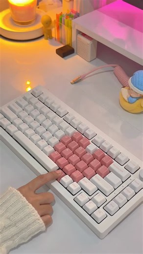 jennL 🌸 on Instagram: "My pink heart is officially obsessed! I finally got the “Heart of Love” Ceramic Keycap Set in pink from @cerakey_official , and they are even more stunning than I imagined. 💖 If you have never tried ceramic keycaps, the feel is completely different. They are cool to the touch, heavy, and have a unique “clack” that you just can’t get with plastic. The soft pink glaze gives my board such a sophisticated and dreamy look. ☁️🌸 Keyboard: Akko 5075S VIA Barebone Switch: Akko V