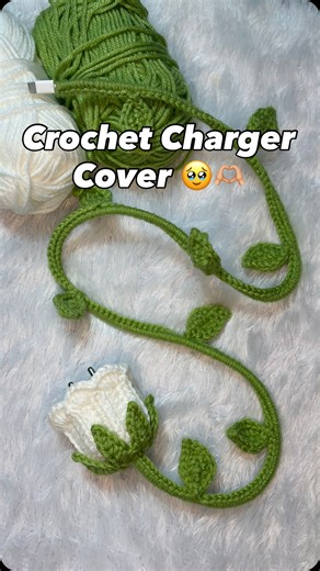 @leisure_loopz on Instagram: "Who said chargers can’t be dressed pretty? 🌷✨ •Protect your charger before it breaks 🌿⚡ •Customisable as you want 🪡🧶 • DM to order 💚 . . . . #crochetlove #handmade #chargercover #giftideas"