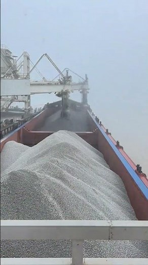 The process of loading gravel at the barge terminal