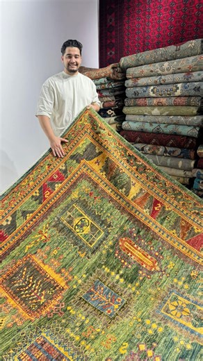 Afghan handmade Carpets (1979) on Instagram: "A Masterpiece of Afghan Craft – Where Tradition Meets Art This stunning 3 x 4.2 m (10 x 14 ft) handmade Afghan carpet showcases vibrant tribal motifs, rich earthy tones, and centuries-old weaving heritage. Every pattern is knotted by hand using natural dyes and hand-spun wool, giving it depth, character, and timeless authenticity. Price: 14,800 AED ✔️ Free worldwide delivery A rare statement piece that elevates any room into a place of warmth, cultur