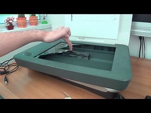 How to repair a shattered scanner glass with parts from an old one