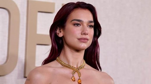 Dua Lipa heats track with 'Training Season' music video