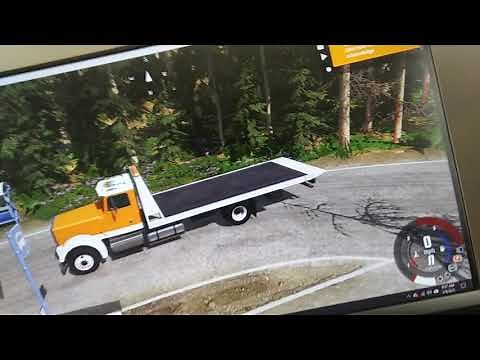 How to put the bed of the tow truck down in BeamNG
