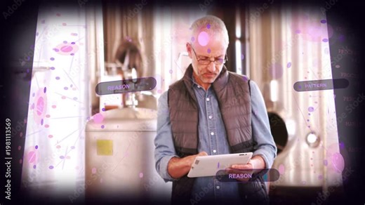 Camera pulling back operator tapping white tablet in brewery animated UI marking tanks for checks
