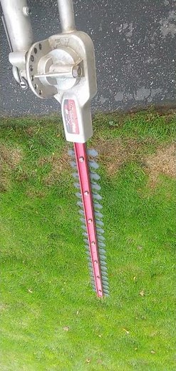 Echo PAS-2620 running an Atlas articulating hedge trimmer attachment