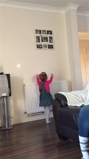 Child Plays Peek-a-Boo with Light | Jukin Licensing