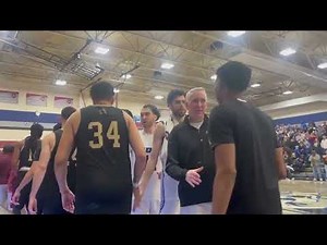 Daemen men's basketball celebrates winning the East Coast Conference title