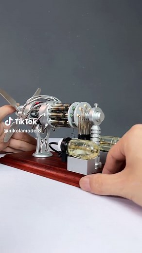 Enhanced Double Gas Tank Stirling Engine with 3-Wheel Motor