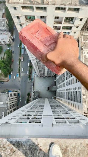 At What Height Does a Brick Finally Break? 😳🧱 I tested how high a brick needs to fall before it finally breaks. 1 ft ❌ 3 ft ❌ 5 ft ❌ 8 ft ❌ 15 ft 💥 Watch till the end to see the exact height 😳🧱 #shorts #experiment #bricktest #physics #scienceexperiment #curiosity #satisfying #viralshorts | MrPlipai
