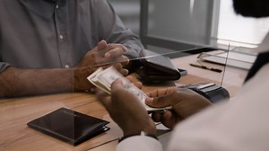 Business Transaction with Money Exchange | Free Stock Video Footage