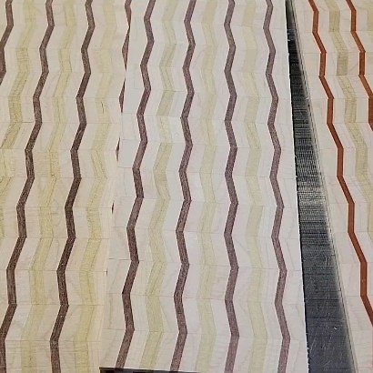 The chevron patterns have been glued up and resawn. Now to run them...