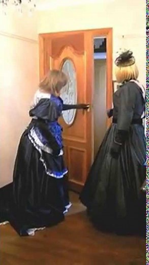 Mistress Lady Penelope's maids in historical dress at Mistress' country manor house 07970183024