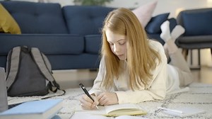 Female Student Preparing Exam On Floor Stock Footage Video (100% Royalty-free) 1070522863 | Shutterstock