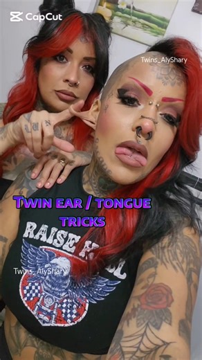 Ear twisting time🤣 #twins #bodymods #splittongue #tonguesplit #gaugedears