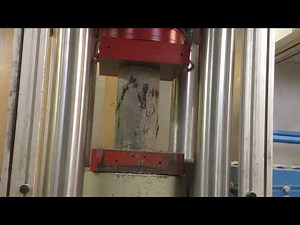 Test de compression du béton : forces et énergie