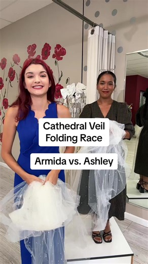 Cathedral Veil Folding Race: Armida vs. Ashely 🏁 Who do you think will win?! Our expert bridal stylists LOVE what they do and can't wait to help you find your dream dress and accessories for less at GARNET grace! ❤️ https://garnetandgrace.com/ | Garnet and Grace Bridal Boutique