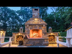 Outdoor Stone Fireplace in a Private Backyard