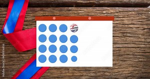 Animation of token template card and voting text moving over ribbon and wooden background