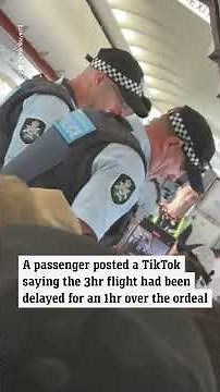 Allegedly drunk Jetstar passenger is escorted off a plane by five cops