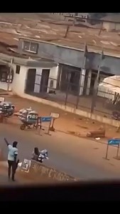 Armed robbers were carrying bags of money out of banks they robbed at Uromi, Edo State today. | GIO TV