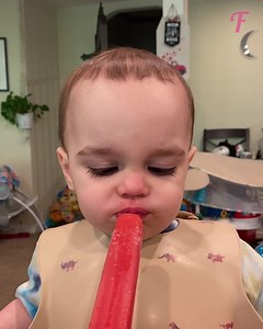 Adorable baby tastes a popsicle for the first time. | Fabiosa Daily