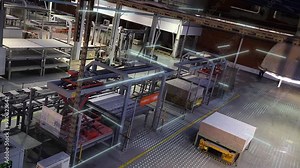 Visualization of futuristic technologies in an automated factory. Automated factory with self-managed robots. Robots in an automated factory. Visualization of technologies in an automated factory