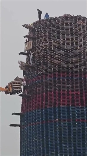 World’s Tallest Bonfire Tower Attempt… Built From Thousands of Wooden Pallets! 😱🔥