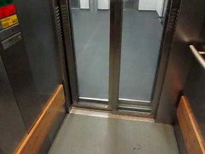 ThyssenKrupp traction glass elevator at a parking garage at Düsseldorf airport