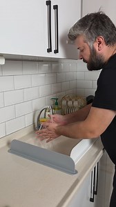 Do You Know Why Your Countertop Is Always Wet? This is the real reason your countertop is soaked in water after every wash… This flexible silicone barrier, placed on the edge of your sink, instantly stops splashes and keeps your countertop dry. Its structure is entirely soft silicone; easy to install, easy to clean, and its vacuum-sealed base ensures it never slips. You won't get wet while washing dishes, and the countertop won't become a lake. A truly significant difference in comfort. Everyone