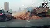 Driver miraculously survives being crushed by a truckful of bricks
