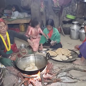 Cooking wheat bread in oil in the village rural. | Village Lifestyle