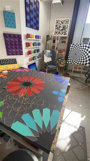 Creating Vibrant Geometric Art in a Colorful Studio