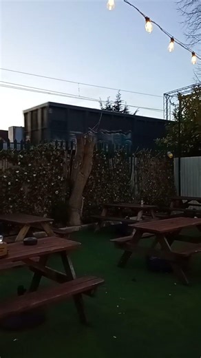 Freightliner aggregate wagons being hauled past