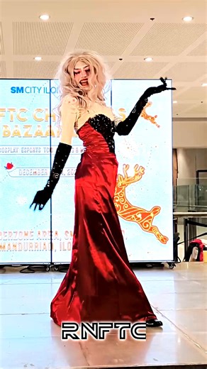 SPOTLIGHT ON at RNFTC Christmas Bazaar 2.0! 🔦✨ Give it up for our incredible champion, Azzmodeust! 👑 Watch them transform into the fabulous Angel Dust from Hazbin Hotel for a Drag performance you’ll never forget! 🕷️💖✨ #rnftc #rnftcevents #bazaar #cosplay #anime #gaming #tabletop #christmas #intermission #performance #hazbinhotel #angeldust | RNFTC